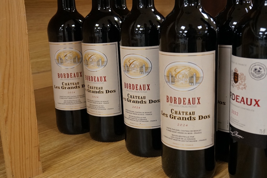 Eight bottles of Chateau Les Grands 2024, and a bottle of Bordeaux 2022